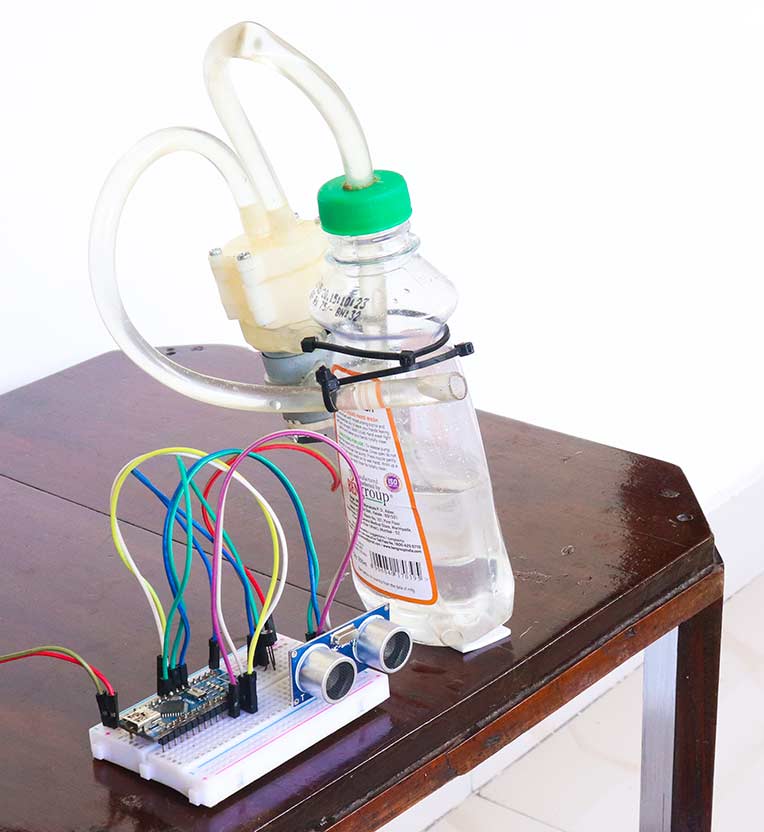 Automatic Hand Sanitizer Dispenser using Arduino - How to make a DIY contactless hand sanitizer dispenser using an Arduino board?